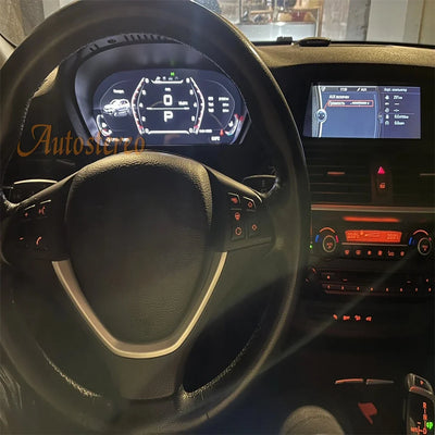 CarPlay BMW X5 E70 vue de face, tableau de bord numérique installé